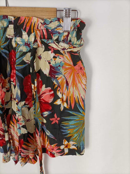 STRADIVARIUS.Pantalones flores hawaianas T.s