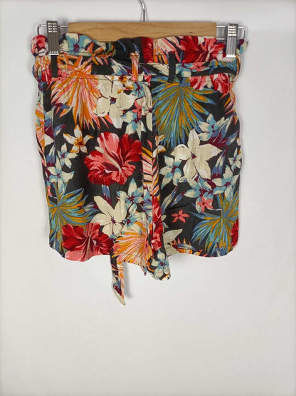 STRADIVARIUS.Pantalones flores hawaianas T.s