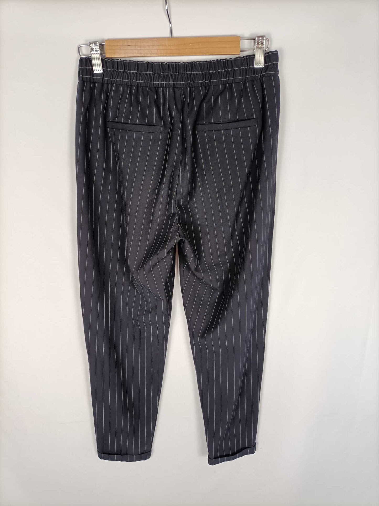 BERSHKA.Pantalones azules rayas T.m