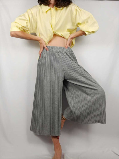 ZARA KIDS.Pantalones grises plisados T.13/14