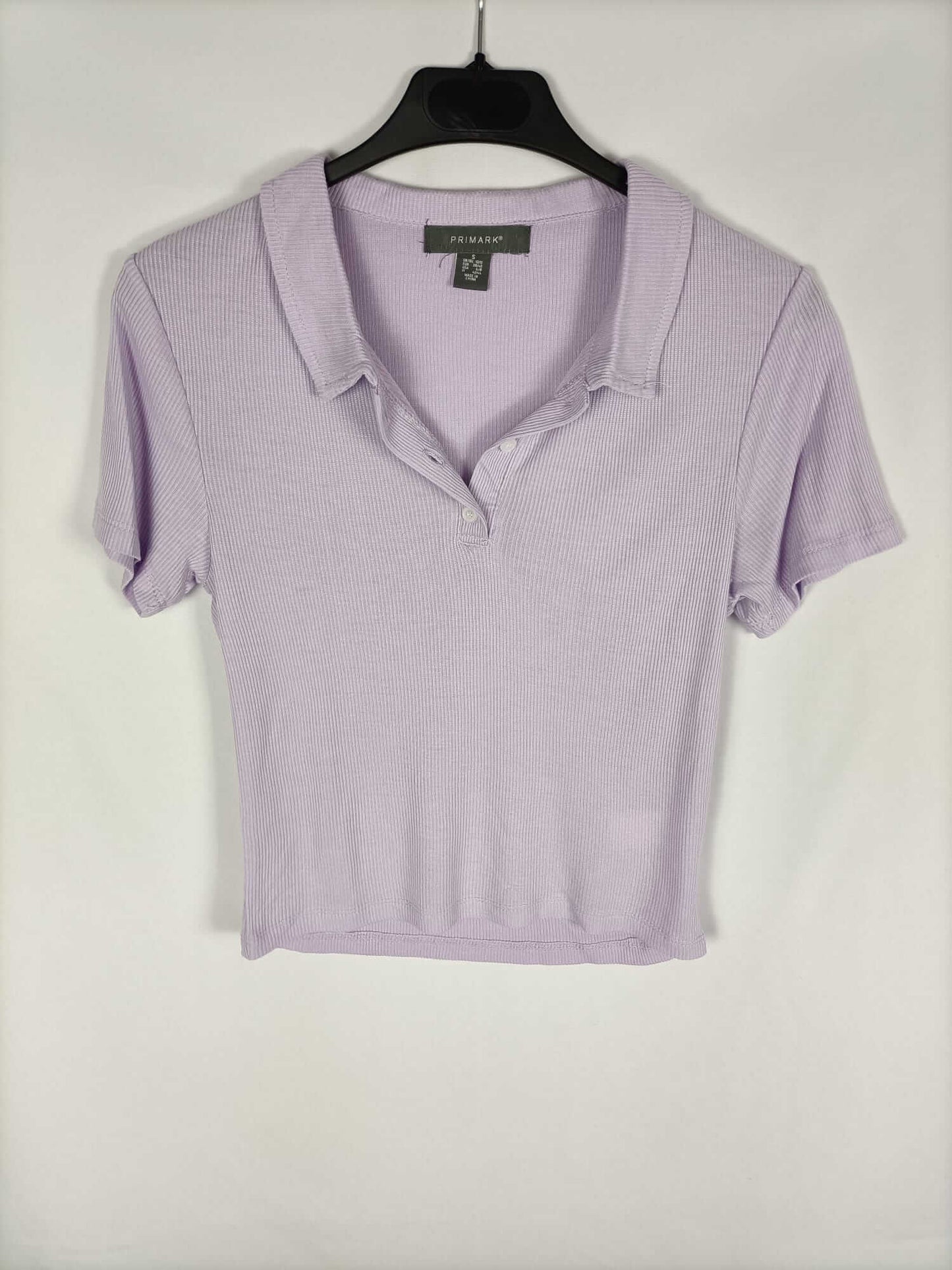 PRIMARK. Polo lila T.s