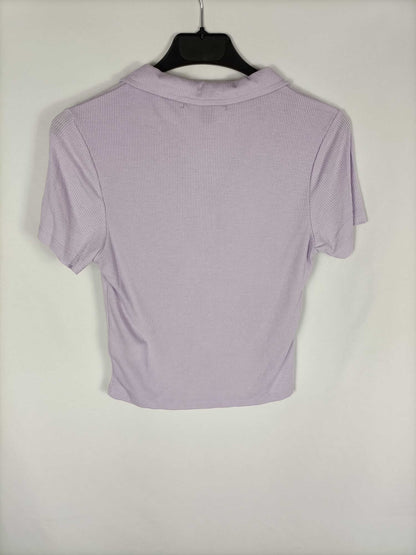 PRIMARK. Polo lila T.s