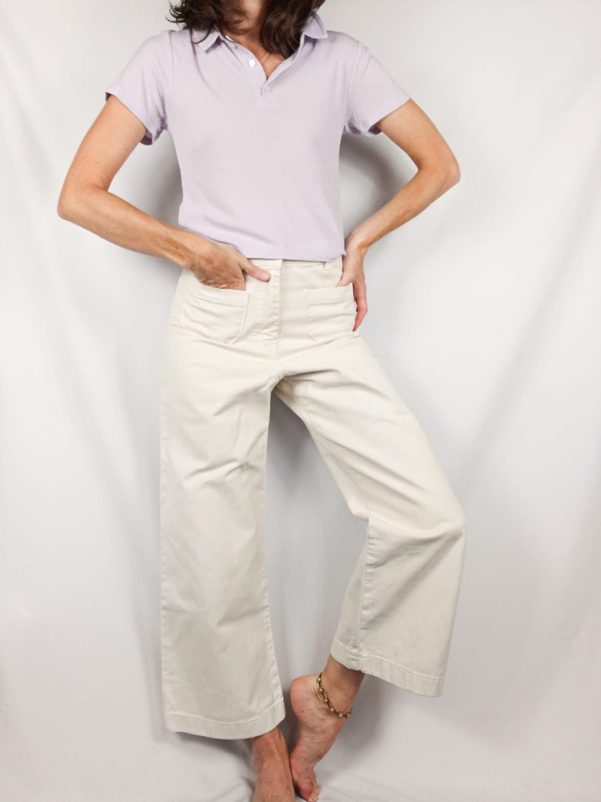 PRIMARK. Polo lila T.s