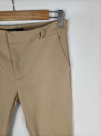 STRADIVARIUS.Pantalones beigesT.36