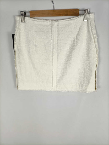 ZARA. Falda blanca tweed T.s