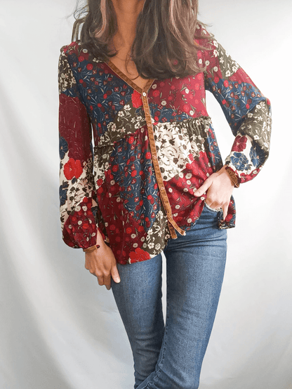 ZARA.Blusa multiestampado flores T.XS