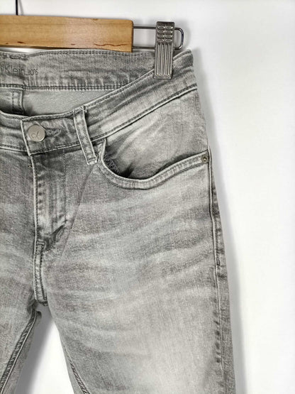 CALVIN KLEIN. Denim grises T.27 (36)