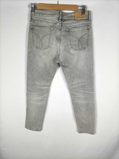 CALVIN KLEIN. Denim grises T.27 (36)