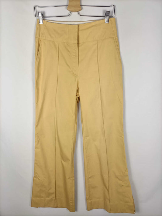 MANGO. Yellow bell-bottom trousers, size 36