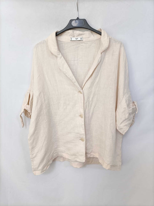 MANGO.Blusa beige T.L