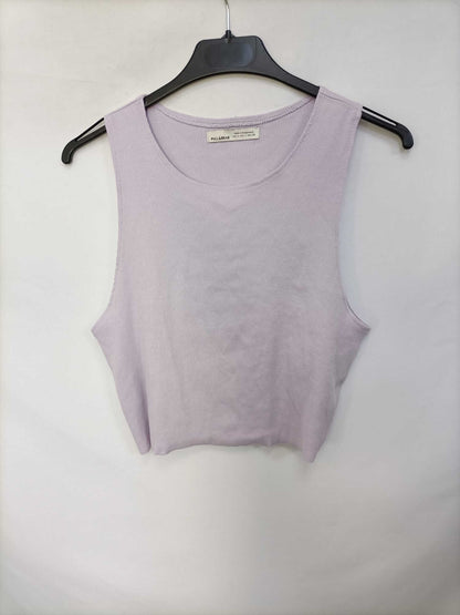 PULL&BEAR.Top lila canalé T.L