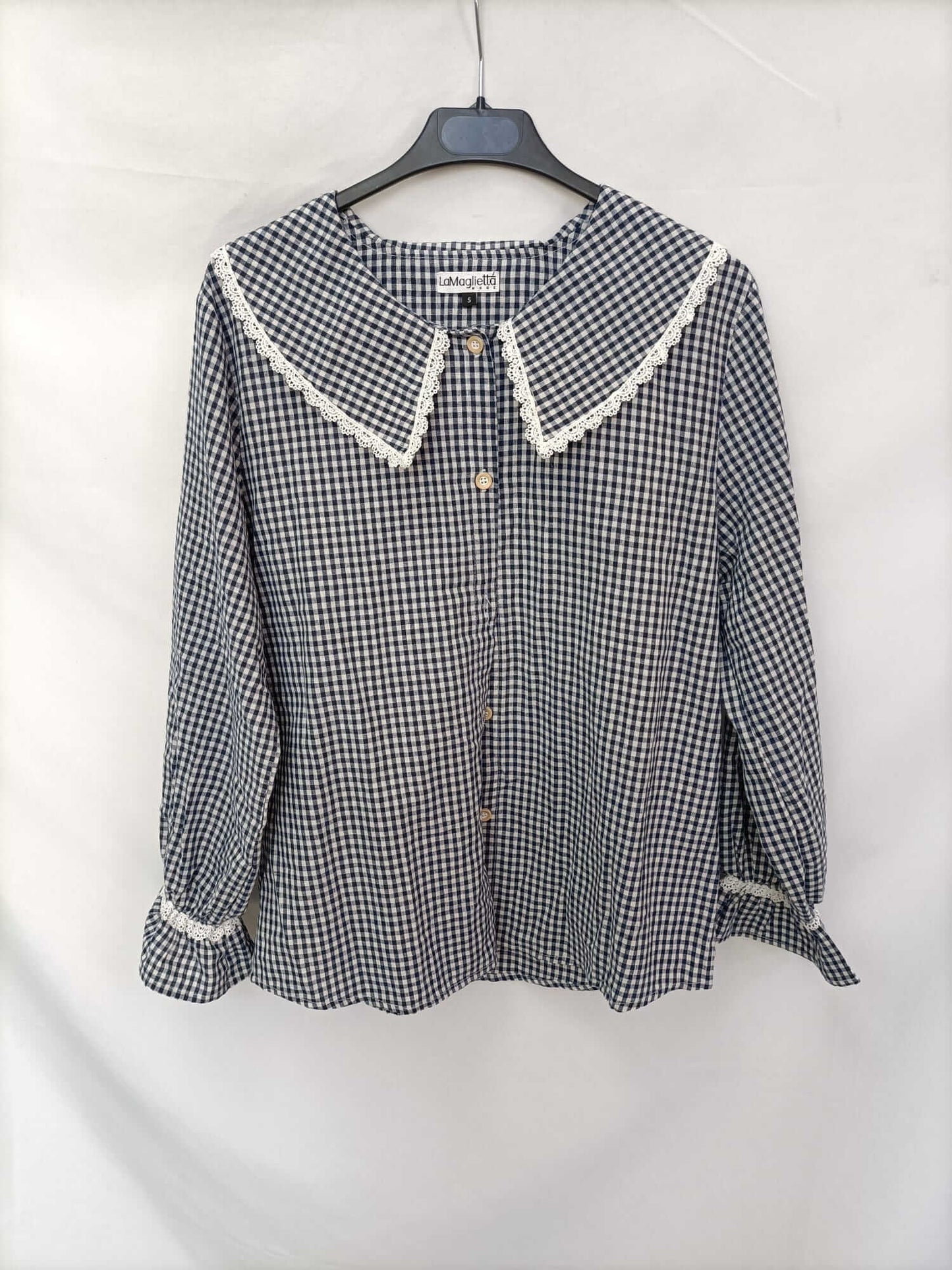 THE T-SHIRT. Gingham check blouse with a baby collar.
