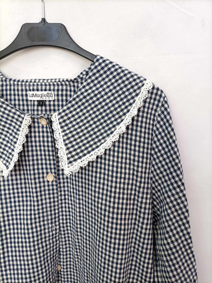THE T-SHIRT. Gingham check blouse with a baby collar.