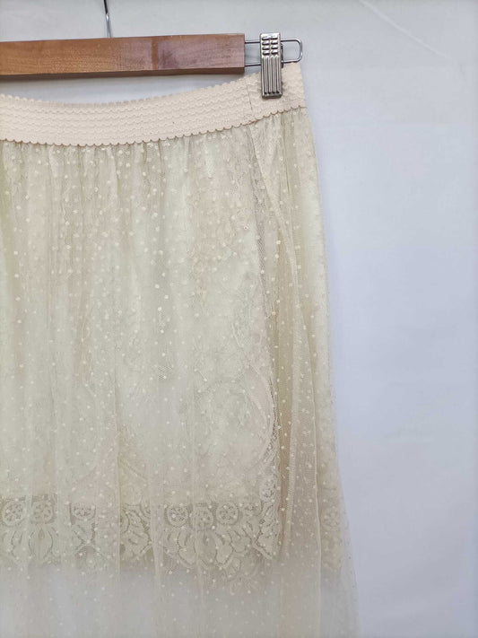 OTRAS. Falda midi tull Tu