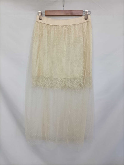 OTRAS. Falda midi tull Tu