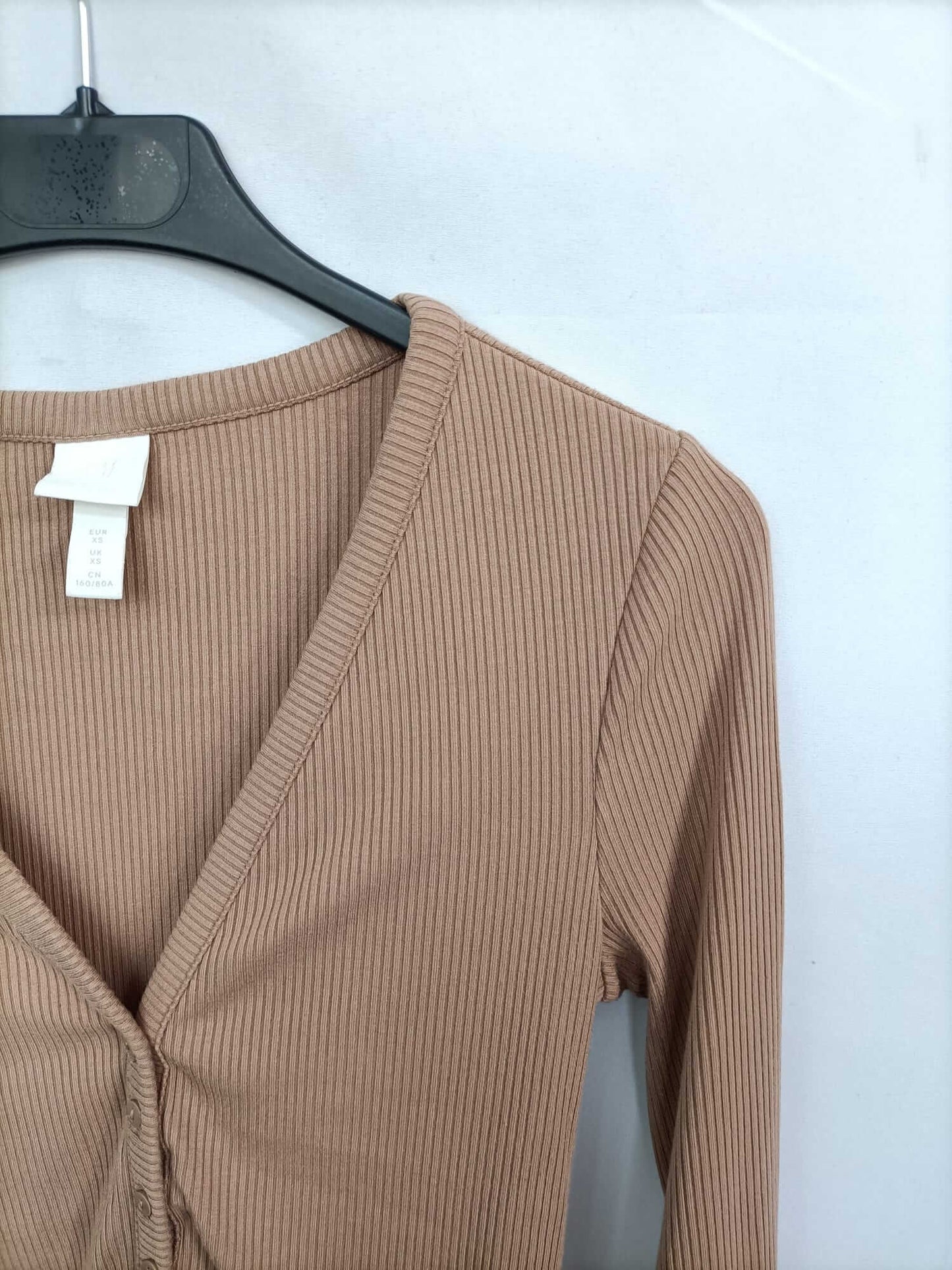 H&M. Top canalé camel T.xs