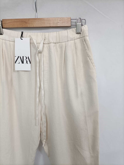 ZARA. Pantalón beige algodón T.xs