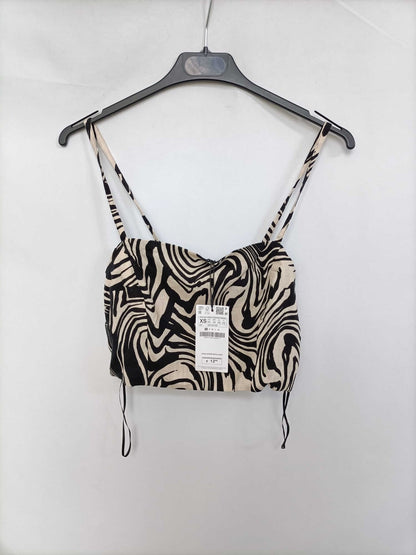 STRADIVARIUS. Top cebra algodón T.xs