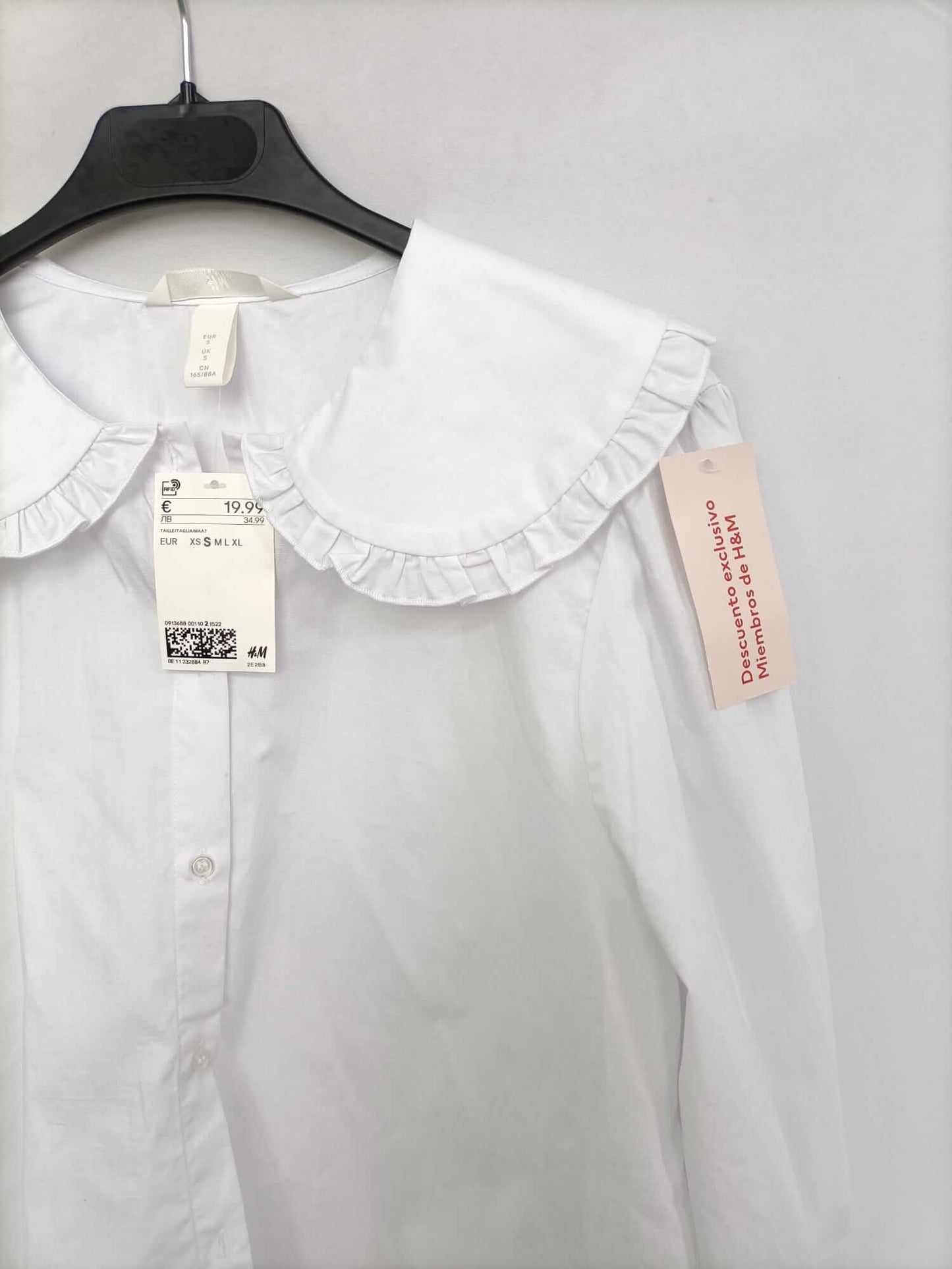 h&M. Blusa blanca cuello bebe T.s