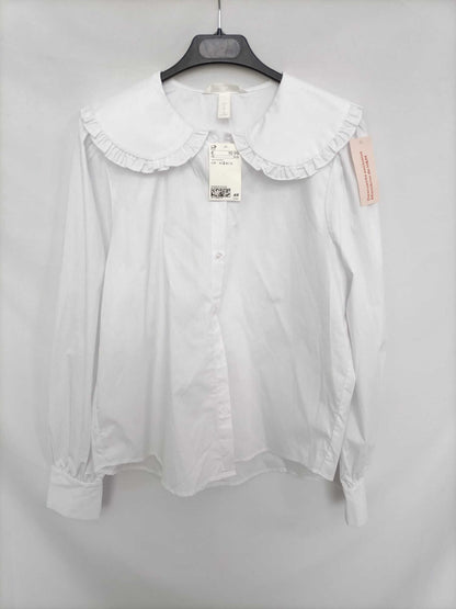 h&M. Blusa blanca cuello bebe T.s