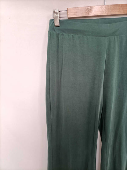 NATURA. Pantalón elástico verde T.s