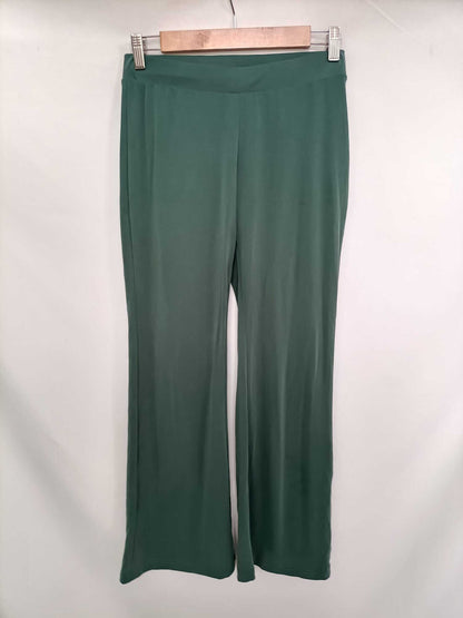 NATURA. Pantalón elástico verde T.s