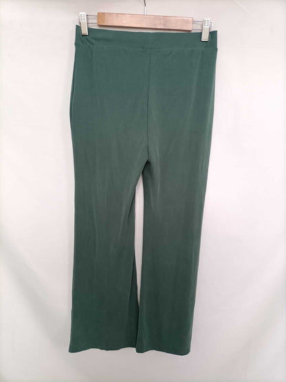 NATURA. Pantalón elástico verde T.s