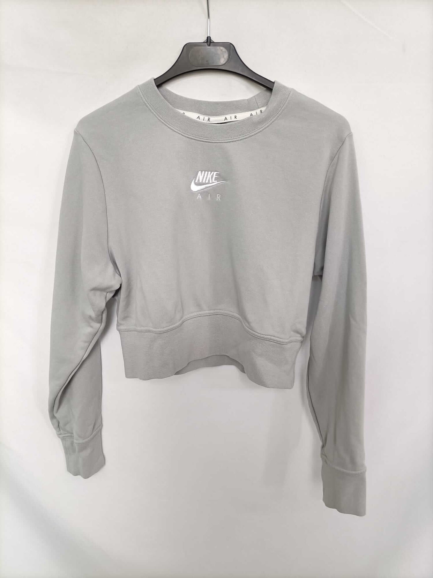 NIKE. Sudadera gris cortita T.m