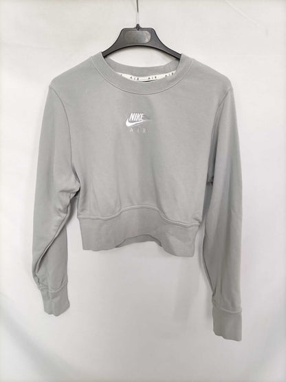 NIKE. Sudadera gris cortita T.m