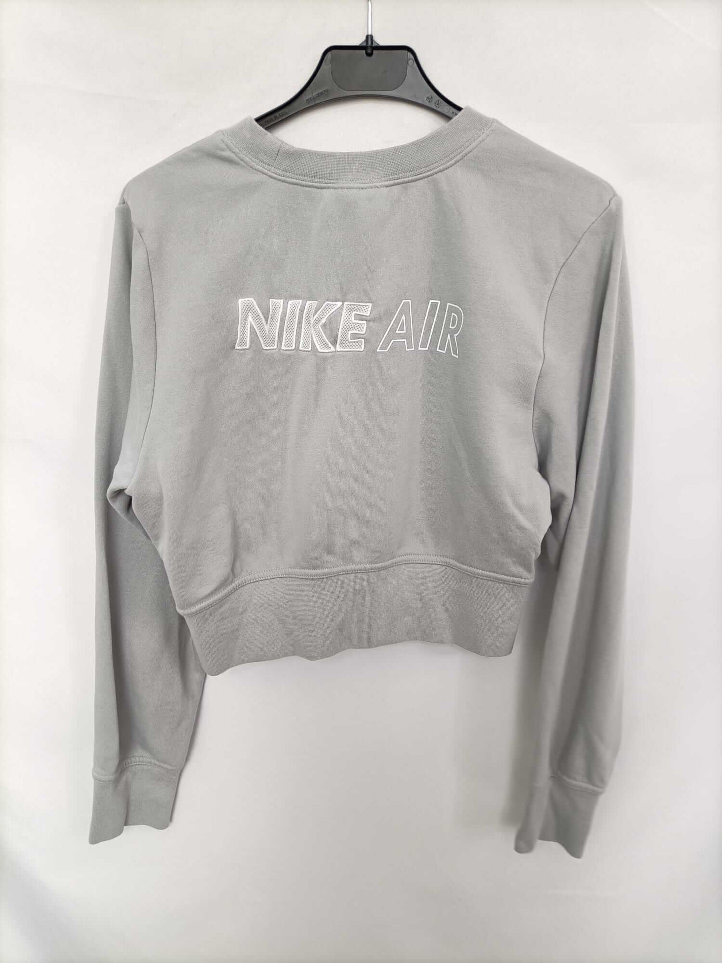 NIKE. Sudadera gris cortita T.m