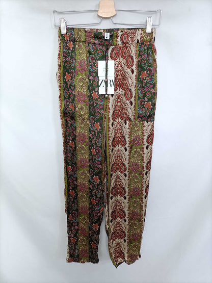 ZARA. Floral print trousers T.xs