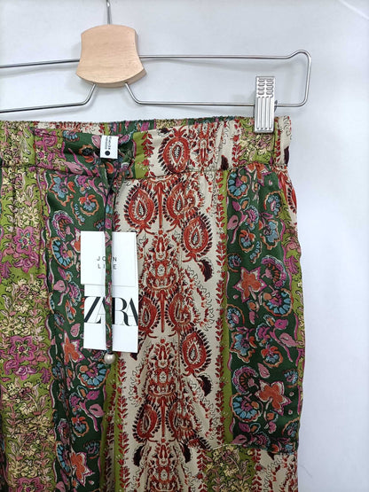 ZARA. Floral print trousers T.xs