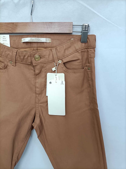 ZARA.Pantalones camel encerados T.36