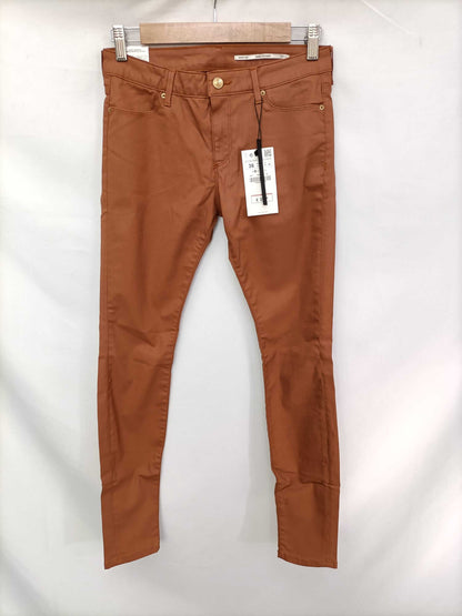 ZARA.Pantalones camel oscuro T.36