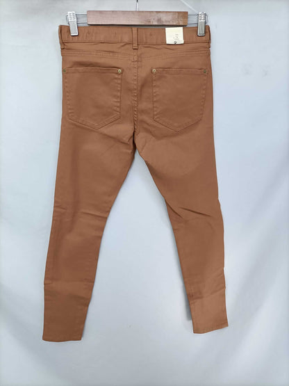 ZARA.Pantalones camel encerados T.36