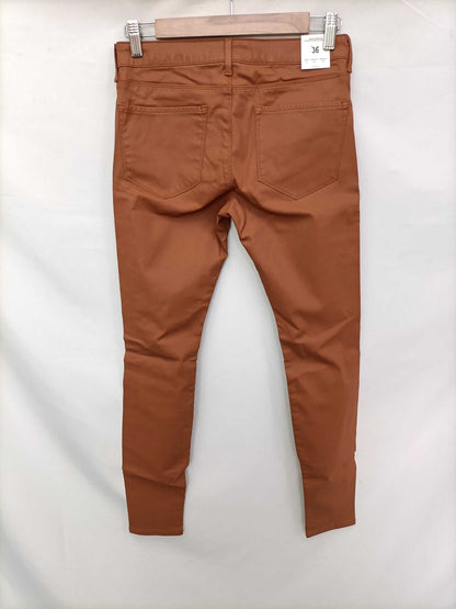 ZARA.Pantalones camel oscuro T.36