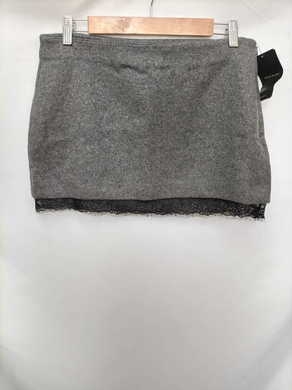 ZARA.Falda gris franela T.m (44)
