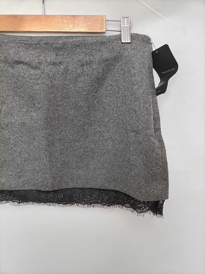 ZARA.Falda gris franela T.m (44)