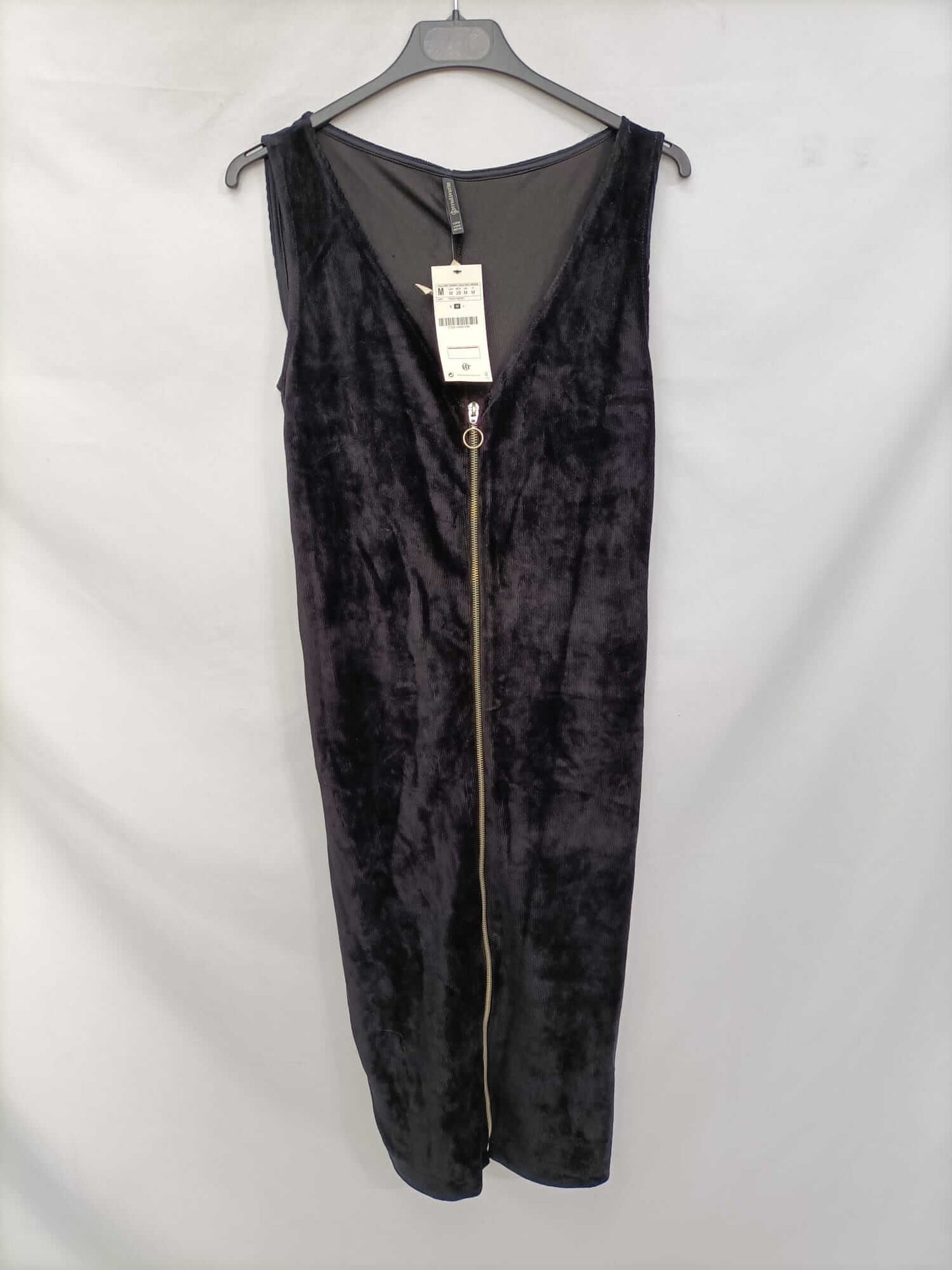 STRADIVARIUS.Vestido negro micropana T.L