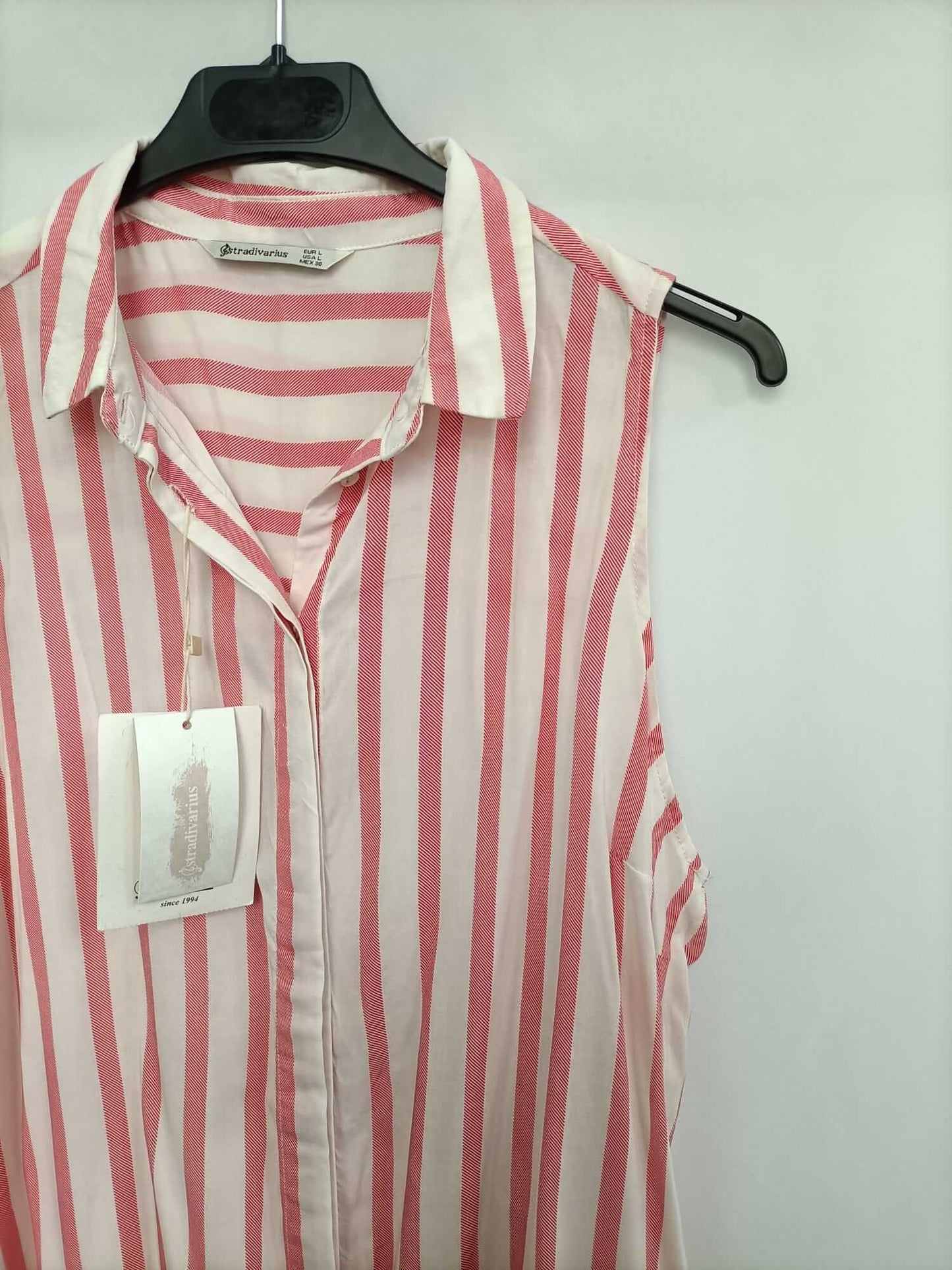 STRADVARIUS. Blusa sin mangas rayas T.L