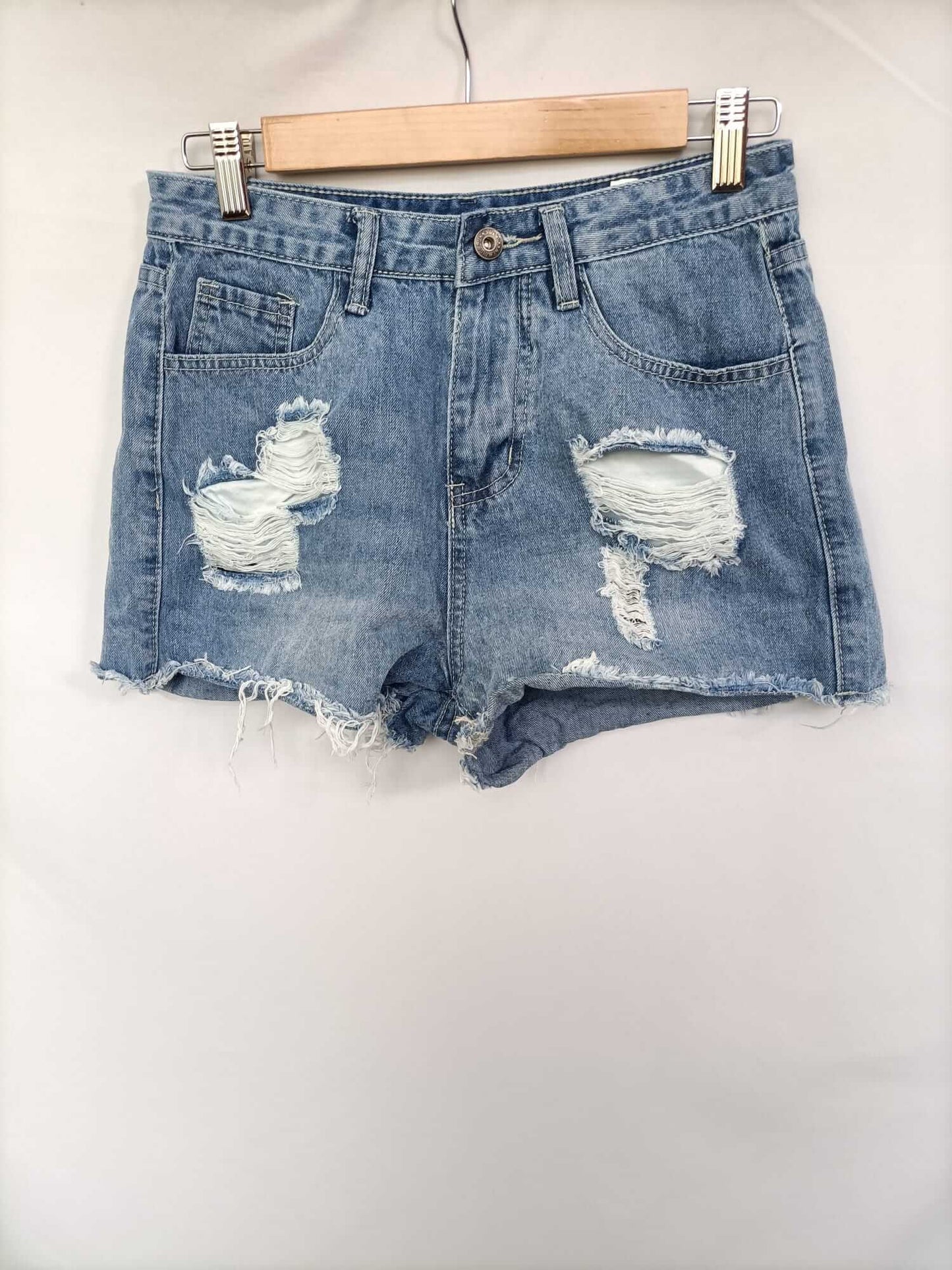 SHEIN. Shorts denim rotos T.xs