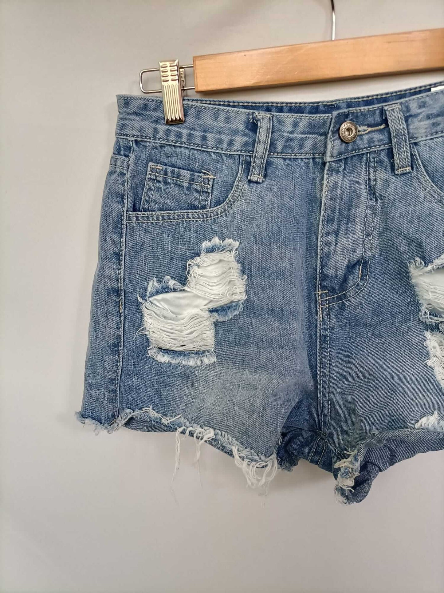 SHEIN. Shorts denim rotos T.xs