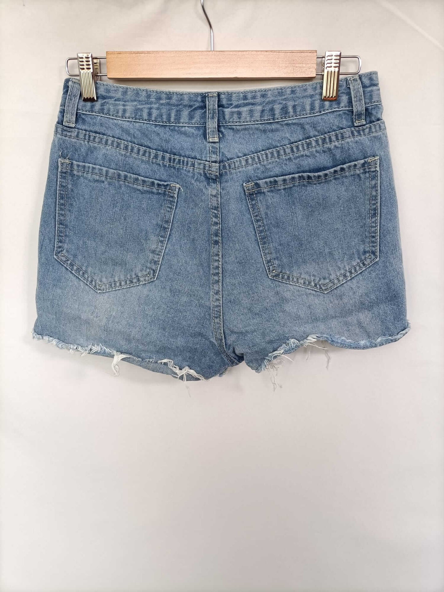 SHEIN. Shorts denim rotos T.xs
