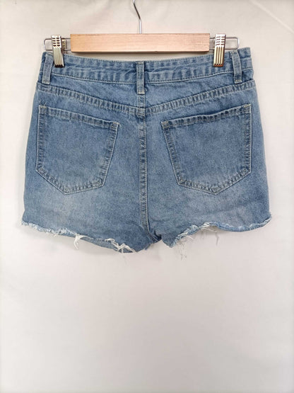 SHEIN. Shorts denim rotos T.xs