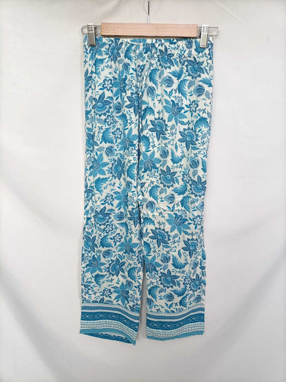 WOMEN'SECRET. Pantalón fluido flores T.xs