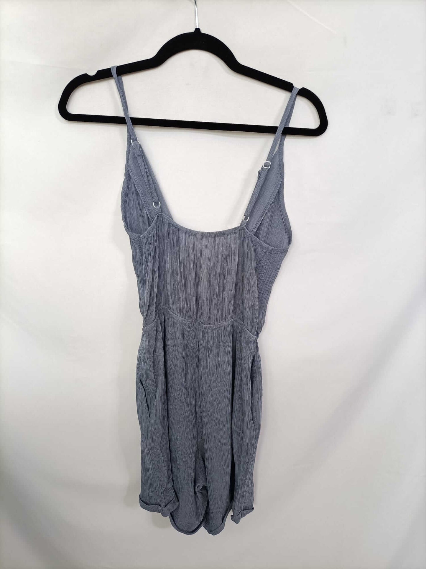 OTRAS. Mono gris plisado T.s