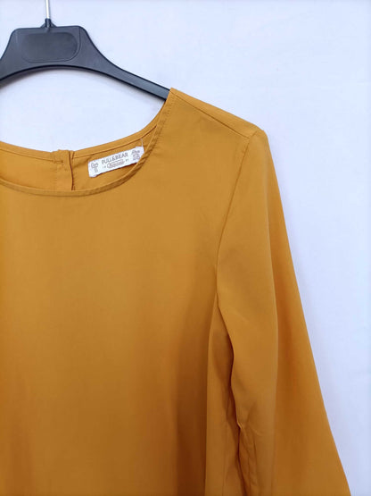 PULL&amp;BEAR. Mustard button-down blouse