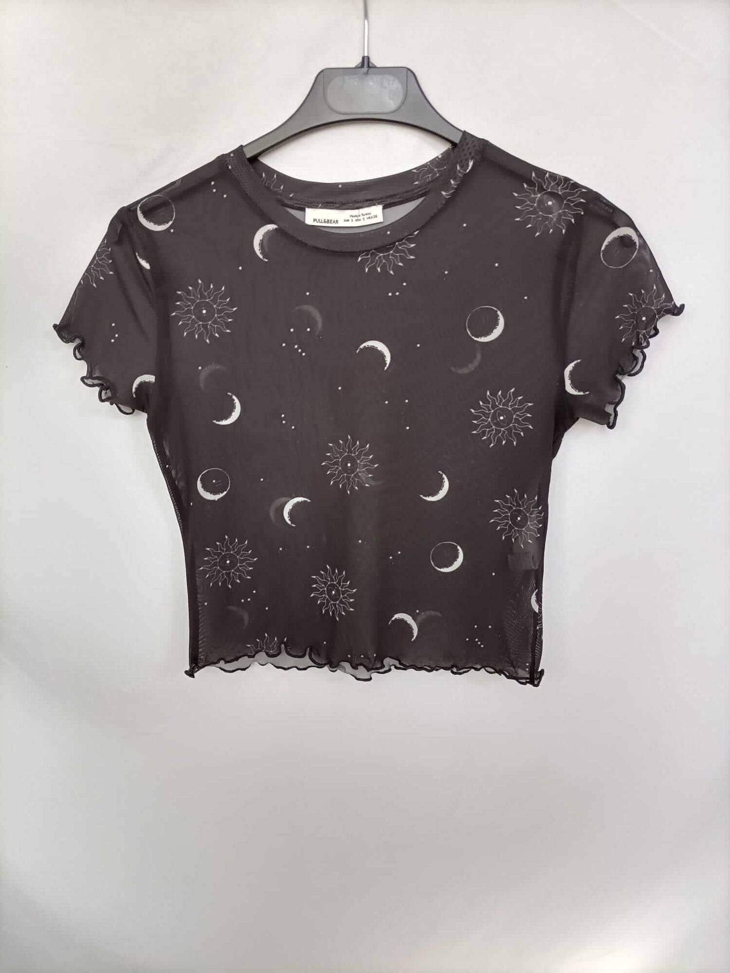 PULL&BEAR. Top rejilla lunas y soles T.s