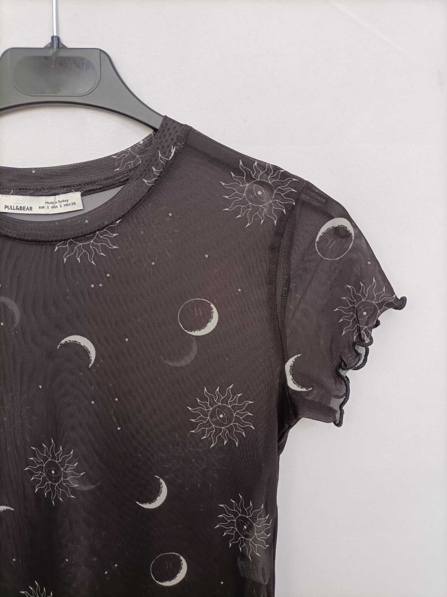 PULL&BEAR. Top rejilla lunas y soles T.s