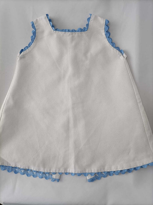 OTRAS.Faldón blanco piqué T.9-12 meses